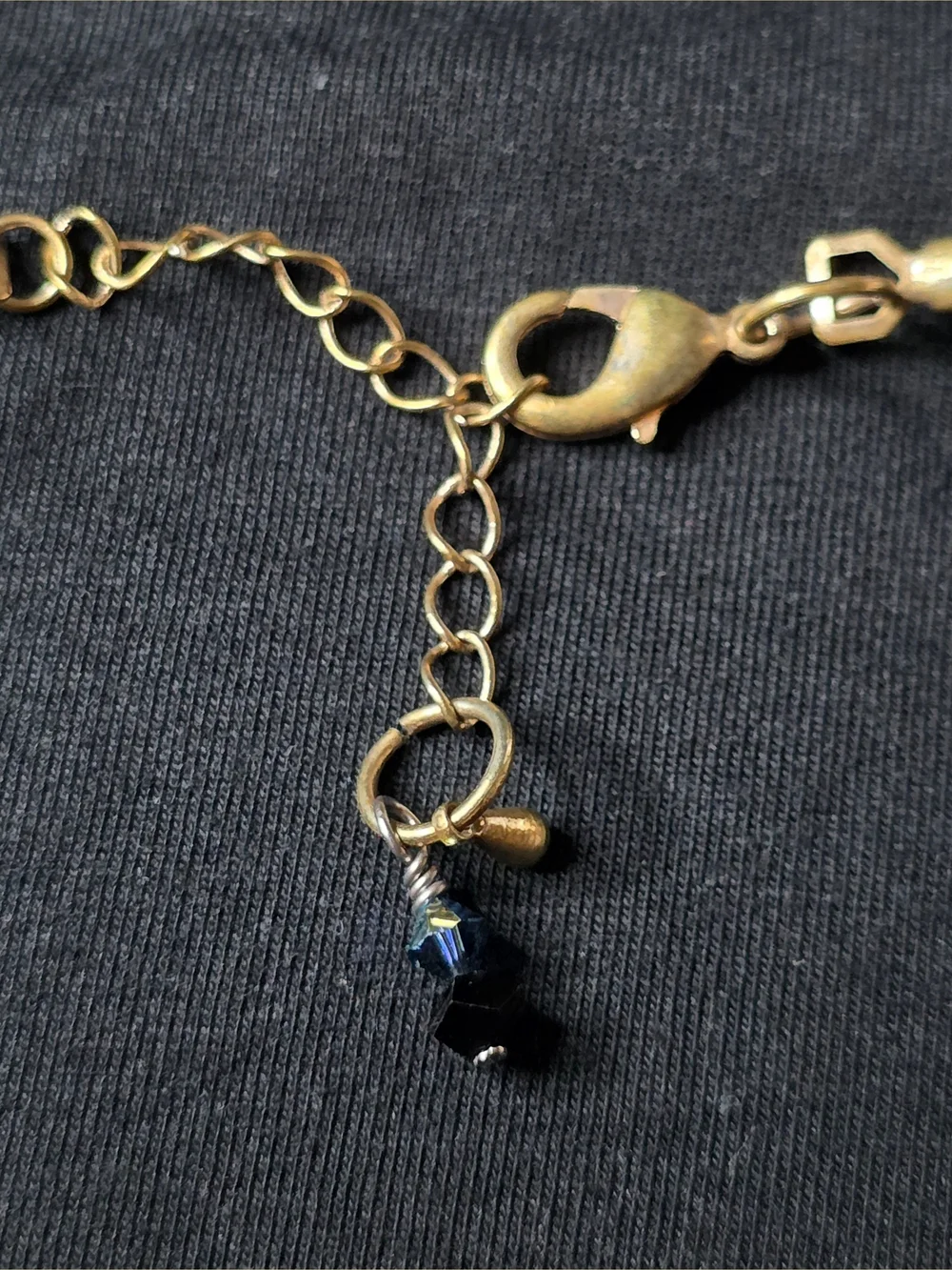 Black Ribbon Portrait Pendant Necklace with Gold-Tone Accents